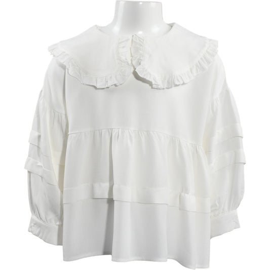 Weiße Mädchenbluse – verspielte Rüschen & weiter Schnitt