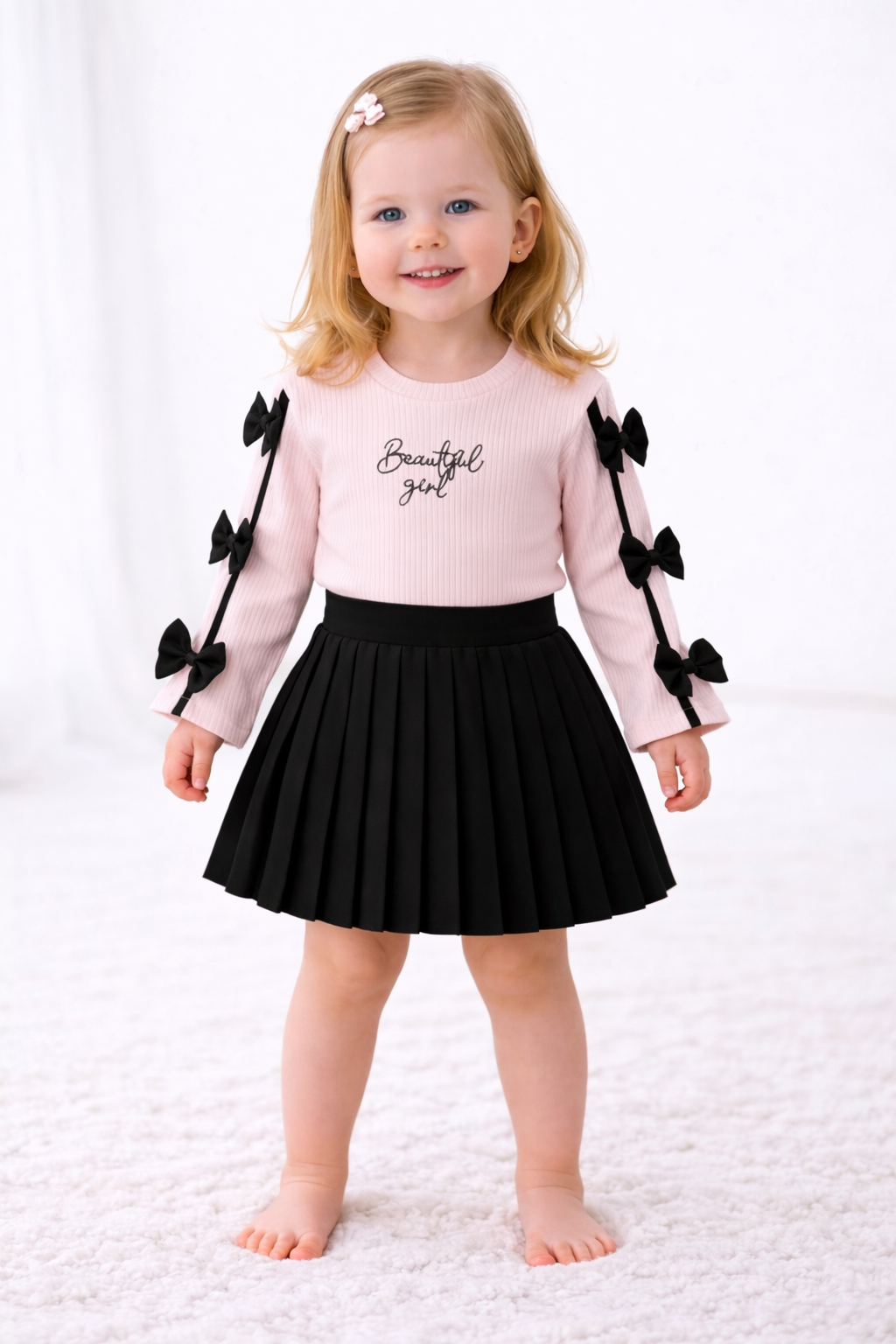 Mädchen 2-teiliges Outfit – Langarmshirt & Faltenrock mit Schleifen