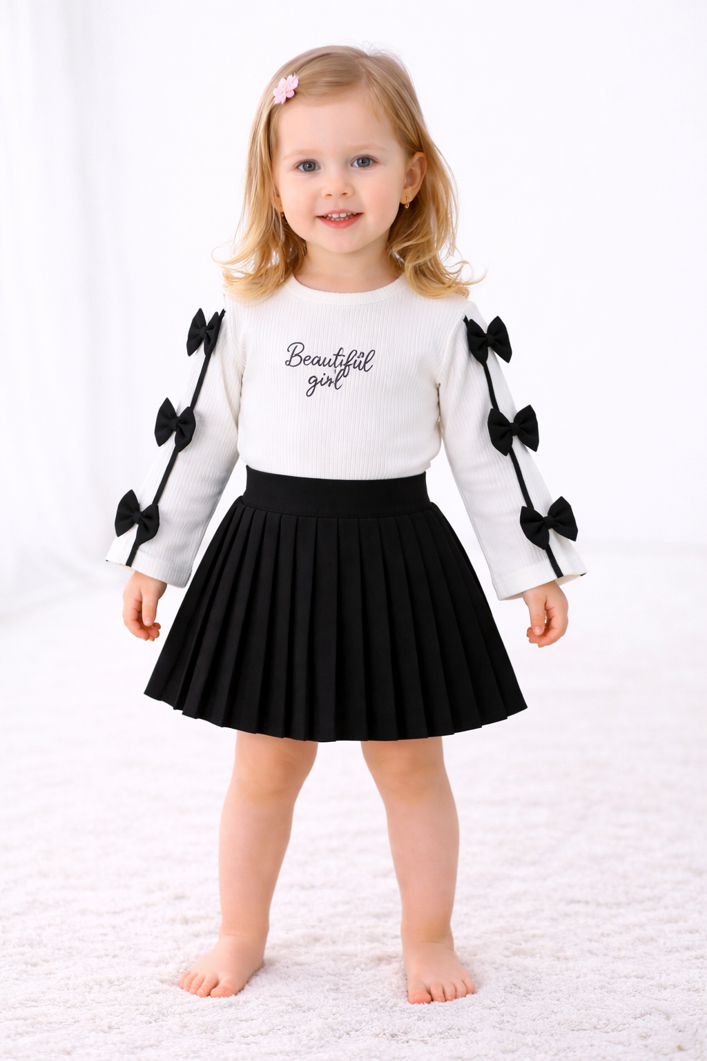 Mädchen 2-teiliges Outfit – Langarmshirt & Faltenrock mit Schleifen